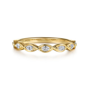 Gabriel & Co. WB16505R8Y43JJ 14 karat yellow gold Contemporary wedding band, front view of pointed oval stones in slender frames that cross between them, with beads at the tips