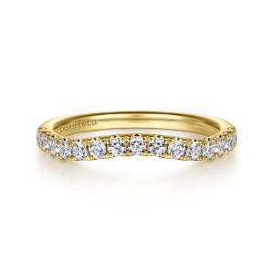 Gabriel & Co. WB16507O8Y44JJ 14 karat yellow gold Contemporary wedding band, front view of diamonds following a shallow dip along the top edge of the band