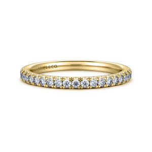 Gabriel & Co. WB16514R8Y44JJ 14 karat yellow gold Contemporary wedding band, front view of a level line of round diamonds with scalloped prong tips