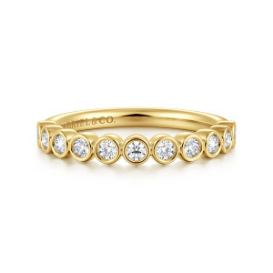 Gabriel & Co. WB16526E8VY44JJ 14 karat yellow gold Contemporary wedding band, front view of round diamonds each ringed by a smooth metal rim, touching in a row