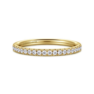 Gabriel & Co. WB16566R4Y44JJ 14 karat yellow gold Contemporary wedding band, front view of a straight hoop with one even line of round diamonds in shared prongs