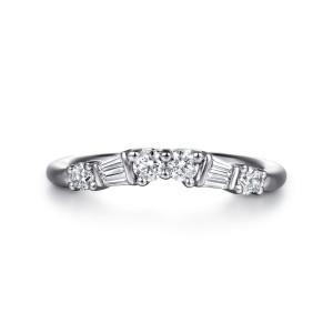Gabriel & Co. WB16676R8W44JJ 14 karat white gold Contemporary wedding band, front view of round and tapered baguette diamonds arranged as a mirrored group along a curve