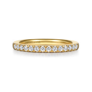 Gabriel & Co. WB16686R12Y44JJ 14 karat yellow gold Contemporary wedding band, front view of a tidy run of round stones between small prong tips