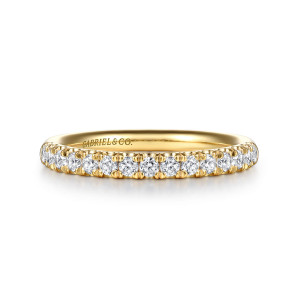 Gabriel & Co. WB16692R8Y44JJ 14 karat yellow gold Contemporary wedding band, front view of round stones with rounded prong tips lined up along the top of the hoop
