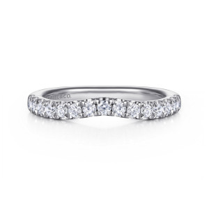 Gabriel & Co. WB16696O8W44JJ 14 karat white gold Contemporary wedding band, front view of a slight dip in the top edge with close set round diamonds