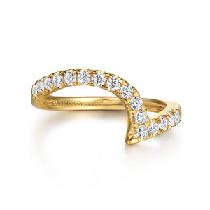 Gabriel & Co. WB16698R8Y44JJ 14 karat yellow gold Contemporary wedding band, front view of a high arch of round stones dropping to a pointed tip