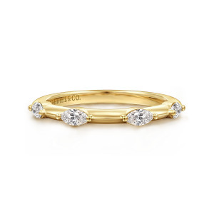 Gabriel & Co. WB16831R8Y43JJ 14 karat yellow gold Contemporary wedding band, front view of pointed oval stones held by ball tipped prongs on a plain hoop