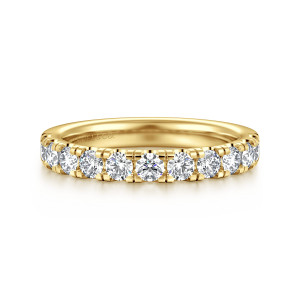 Gabriel & Co. WB16854E12Y44JJ 14 karat yellow gold Classic wedding band, front view of round diamonds separated by squared prongs on a smooth shank