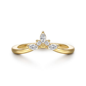 Gabriel & Co. WB16855M5Y44JJ 14 karat yellow gold Starlight wedding band, front view of a plain band rising to a peak with a fan of marquise and round stones