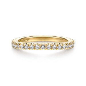 Gabriel & Co. WB16891O8Y44JJ 14 karat yellow gold Classic wedding band, front view of a straight row of small round diamonds between slender prongs