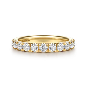 Gabriel & Co. WB16954O8Y44JJ 14 karat yellow gold Classic wedding band, front view of large round stones gripped by paired prongs on a straight hoop