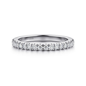 Gabriel & Co. WB16978O12W44JJ 14 karat white gold Classic wedding band, front view of small round stones in shared prongs across a straight hoop