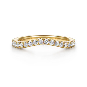 Gabriel & Co. WB16983O8Y44JJ 14 karat yellow gold Classic wedding band, front view of the curved top with round diamonds arching up toward the middle