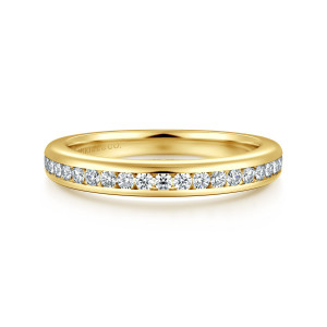 Gabriel & Co. WB16993O12Y44JJ 14 karat yellow gold Classic wedding band, front view of a polished band with round diamonds sitting level between smooth metal walls