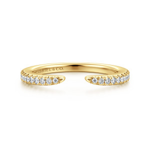 Gabriel & Co. WB16999C12Y44JJ 14 karat yellow gold Contemporary wedding band, front view of a gap between tapered tips lined with round diamonds