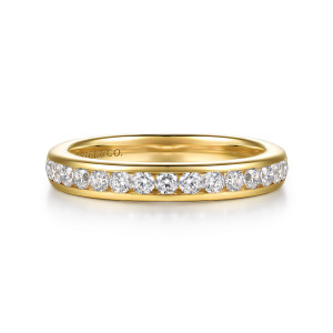 Gabriel & Co. WB17101O8Y44JJ 14 karat yellow gold Classic wedding band, front view of round diamonds in a line between two smooth walls