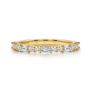 Gabriel & Co. WB17391R8Y44JJ 14 karat yellow gold Contemporary wedding band, front view of baguette diamonds set lengthwise alternating with pairs of small round stones in separate prongs