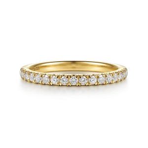 Gabriel & Co. WB17396R8Y44JJ 14 karat yellow gold Classic wedding band, front view of the straight line of round diamonds with a prong between each pair