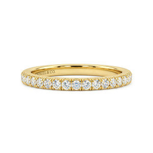 Gabriel & Co. WB17397R8Y44JJ 14 karat yellow gold Classic wedding band, front view of round diamonds held between slender prongs along a straight polished band