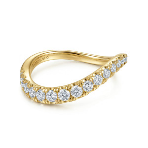 Gabriel & Co. WB17398P8Y44JJ 14 karat yellow gold Contemporary wedding band, angled view of round diamonds stepping down in size along a waving outline