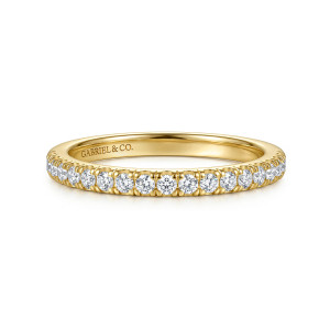 Gabriel & Co. WB17409E8Y44JJ 14 karat yellow gold Classic wedding band, front view of a straight band with a level row of round stones in small prongs