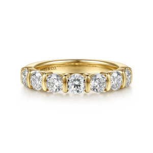 Gabriel & Co. WB17416R12Y44JJ 14 karat yellow gold Contemporary wedding band, front view of large round diamonds separated by upright metal bars