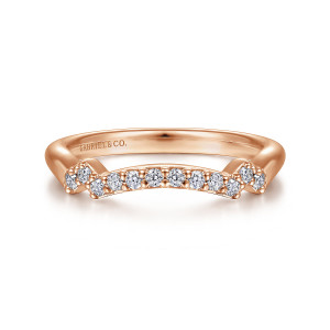 Gabriel & Co. WB6002K44JJ 14 karat rose gold Contemporary wedding band, front view of the short arc of diamonds with staggered stones stepping off each end