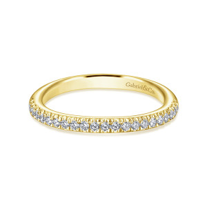 Gabriel & Co. WB6666Y44JJ 14 karat yellow gold Contemporary wedding band, front view of a single line of small diamonds above a smooth hoop with a maker's mark inside