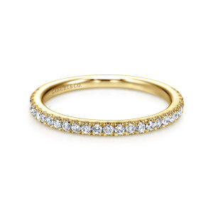Gabriel & Co. WB7259Y44JJ 14 karat yellow gold Classic wedding band, front view of tiny round diamonds and small prongs along the outer edge of the hoop