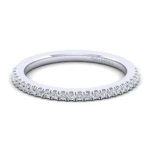 Gabriel & Co. WB7495P4W44JJ 14 karat white gold Contemporary wedding band, front view of the band tilted forward, showing the row of small diamonds and the smooth inside