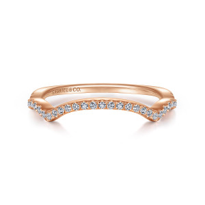 Gabriel & Co. WB914295O0K44JJ 14 karat rose gold Contemporary wedding band, front view of the diamond line dipping in the middle and swelling at each shoulder