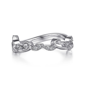 Gabriel & Co. WB915721W44JJ 14 karat white gold Floral Nouveau wedding band, front view of a wavy band with open curls and leaf shaped stations holding small round diamonds