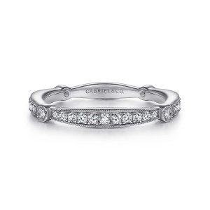 Gabriel & Co. WB96711R8W44JJ 14 karat white gold Victorian wedding band, front view of a milgrain edged bar of round stones flanked by two bezel set stones
