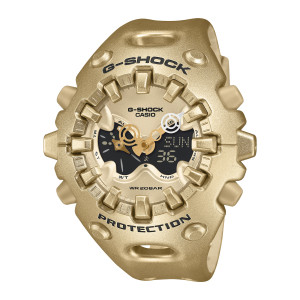 Casio G-Shock GAV01A-9A watch, front view of the gold tone sculpted case with a ring of chunky tabs around the face