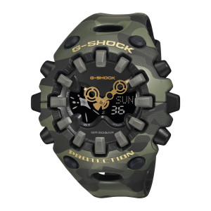 Casio G-Shock GAV01CMG-3A watch, front view of a green camouflage case with taupe block tabs and gold-tone cutout hands
