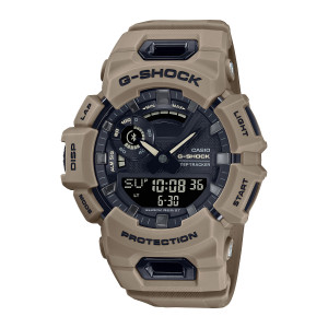 Casio G-Shock Move GBA900UU-5A watch, front view of the tan case, cream hands, black textured dial and wide digital panel with bar scale