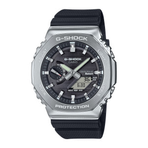 Casio G-Shock G-Steel GBM2100-1A watch, front view of the silver tone octagon, pinstriped black dial and pale green filled hands