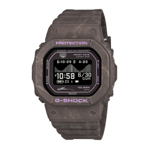 Casio G-Shock G-Lide GBXH5600KI-5 watch, front view of a squared marbled brown case with lilac lettering and a black graph display