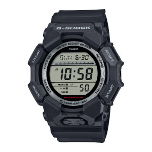 Casio G-Shock GD010-1 watch, front view of a black faceted case with a round gray panel inside a silver-tone ring
