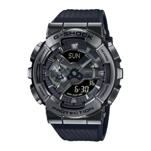 Casio G-Shock G-Steel GM110BB-1A watch, front view of a dark gunmetal stepped bezel around hands, a sub dial and two digital panels