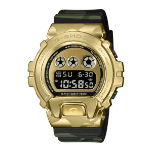 Casio G-Shock GM6900CMG-3 watch, front view of the gold tone shield guard below a black digital panel