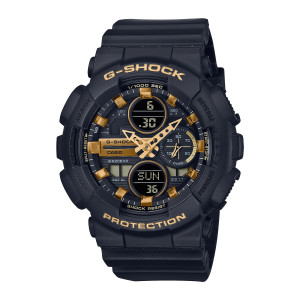 Casio G-Shock GMAS140M-1A watch, front view of a matte black case with two gold ringed windows and gold tone cut out hands