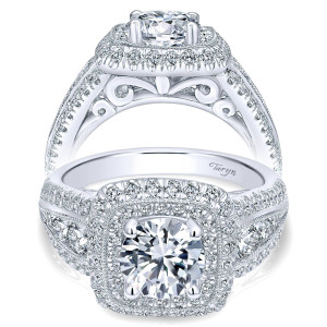 Taryn TE10103W44JJ 14 karat white gold engagement ring, front and profile views of a round center in a double cushion halo over a scrolled filigree gallery