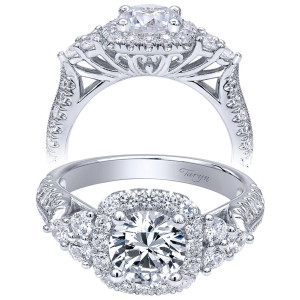 Taryn TE10179W44JJ 14 karat white gold engagement ring, front and profile views of a round center in a cushion halo flanked by rounded side clusters