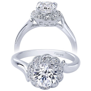 Taryn TE10241W44JJ 14 karat white gold engagement ring, front view of a round center in a scalloped floral halo on a curved bypass shank