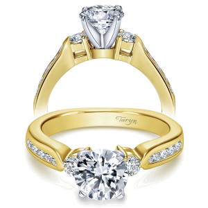 Taryn TE3993M44JJ 14 karat yellow gold engagement ring, two views of a round center between two round side stones above channel set rounds along tapered shoulders