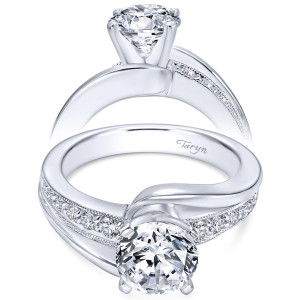 Taryn TE6078W44JJ 14 karat white gold engagement ring, front and profile views of a round center where a plain rail crosses a milgrain pave row