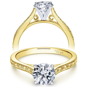 Taryn TE7222M4JJJ 14 karat yellow gold engagement ring, front and profile views of a round center over scrolled gallery work with hand engraved milgrain shoulders