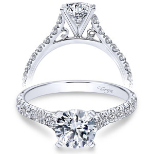 Taryn TE7225W44JJ 14 karat white gold engagement ring, front and profile views of a round center over small filigree scrolls with graduated shared prong shoulders