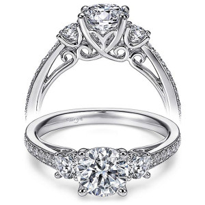 Taryn TE7281W44JJ 14 karat white gold engagement ring, front view of a round center between two rounds with openwork scroll shoulders and milgrain edges